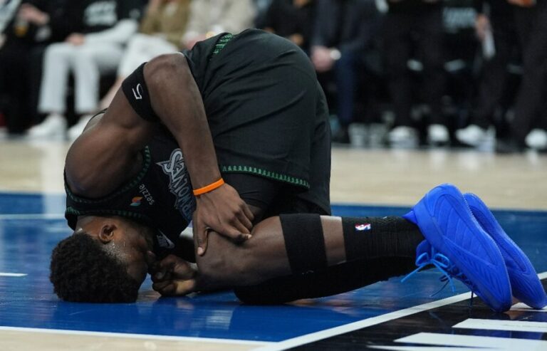 APTOPIX Nuggets Timberwolves Basketball